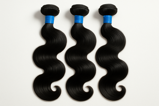 3 bundle of body wave hair extensions  with blue rubber bands around it